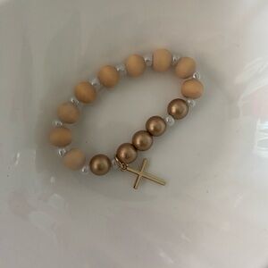 Gold and Tan Beaded Bracelet with Cross Charm